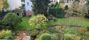 Ferienwohnung "Altstadtblick" in Miltenberg - Blick auf den Garten mit kleinem Teich