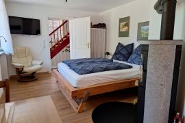 Ferienwohnung Annette Faust in Miltenberg - Bett von der Küchenzeile aus gesehen