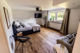 Ferienwohnung Bella Martha in Miltenberg - Wohn- und Schlafzimmer