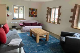 Wohnzimmer in der Ferienwohnung Mauersegler in Miltenberg