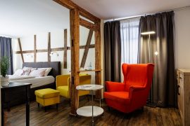 Doppelzimmer mit frei liegendem Fachwerk im Flair Hotel Hopfengarten in Miltenberg