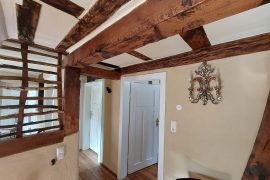 Korridor mit freiliegendem Fachwerk im Ferienhaus "Haus Nostalgie" in Kleinheubach